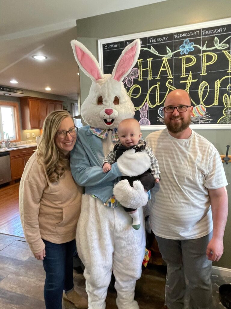 Baby and family with easter bunny