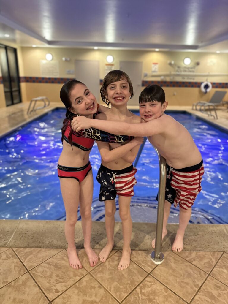 IVF TWINS AND BROTHER AT POOL