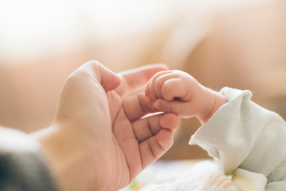 Holding hands with a child