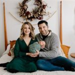 couple holding a baby