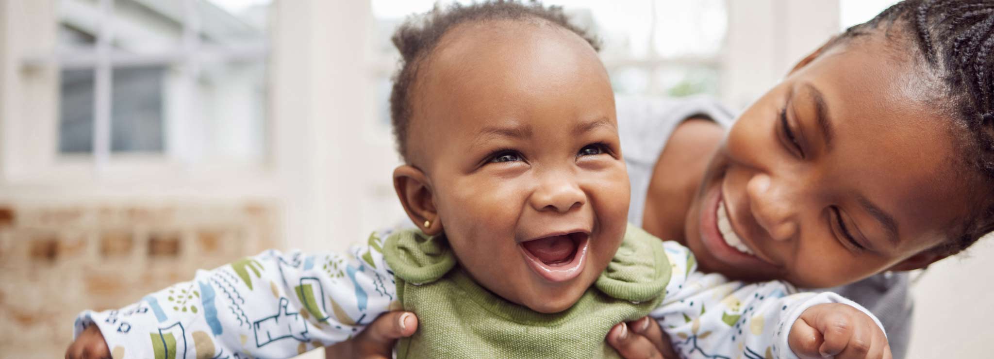 mom and smiling baby